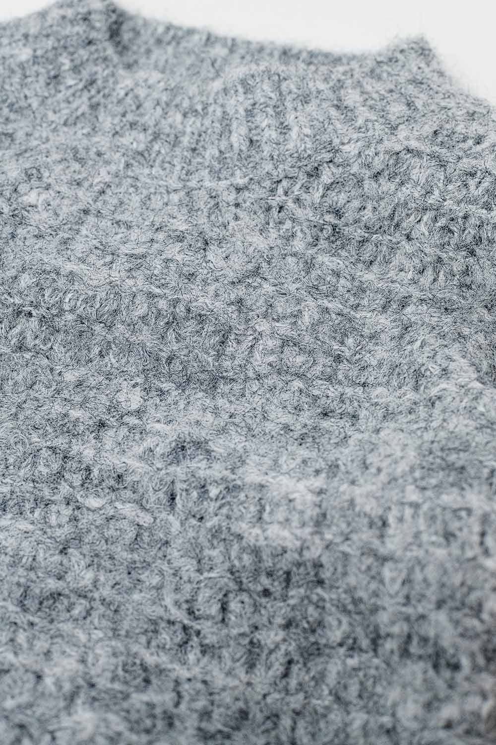 Pull gris en tricot manches ballon